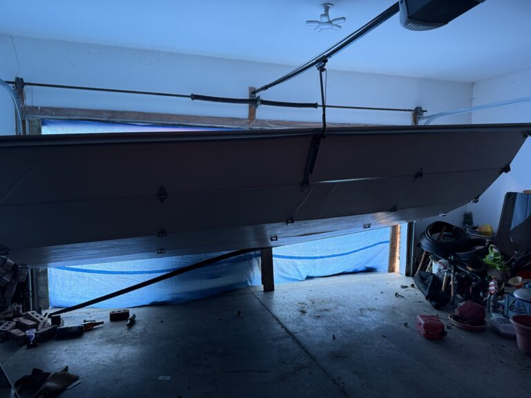 Off-track garage door repair